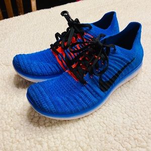 Nike Free RN Flyknit Blue and Orange Running Shoe.